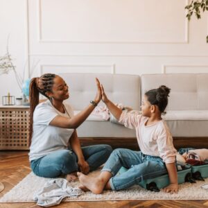 woman giving teen a high five