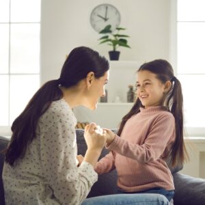 mom talking to daughter 